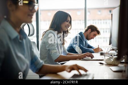 Startup business people group of programmer working as team to find solution to problem Stock Photo
