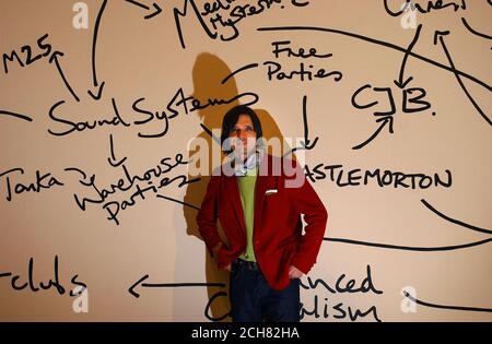 Jeremy Deller, the winner of this years Turner Prize, in front of his work called 'The History of The World' at Tate Britain, London. Stock Photo