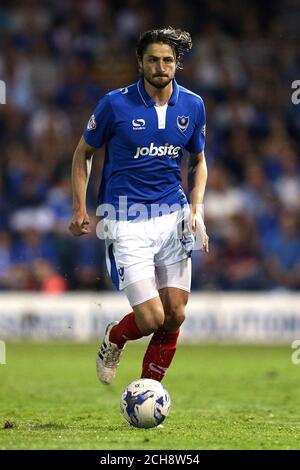 Portsmouth's Christian Burgess during the Sky Bet League Two playoff, first round game at Fratton Park, Portsmouth. PRESS ASSOCIATION Photo. Picture date: Thursday May 12, 2016. See PA story SOCCER Portsmouth. Photo credit should read: David Davies/PA Wire. RESTRICTIONS: EDITORIAL USE ONLY No use with unauthorised audio, video, data, fixture lists, club/league logos or 'live' services. Online in-match use limited to 75 images, no video emulation. No use in betting, games or single club/league/player publications. Stock Photo