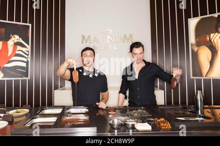 EU, TURKEY, AUSTRALIA, NEW ZEALAND, SINGAPORE ONLY Fashion photographers Mert Alas and Marcus Piggott make their very own personalised Magnum at the launch of the Magnum Double in Cannes. Stock Photo