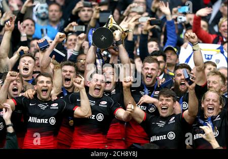 Saracens' Brad Barritt lifts the European Champions Cup trophy during the European Rugby Champions Cup Final at the Parc Olympique Lyonnais, Lyon. PRESS ASSOCIAION Photo. Picture date: Saturday May 14, 2016. See PA story RugbyU Final. Photo credit should read: Adam Davy/PA Wire. RESTRICTIONS: Editorial use only, No commercial use without prior permission, please contact PA Images for further information: Tel: +44 (0) 115 8447447. Stock Photo