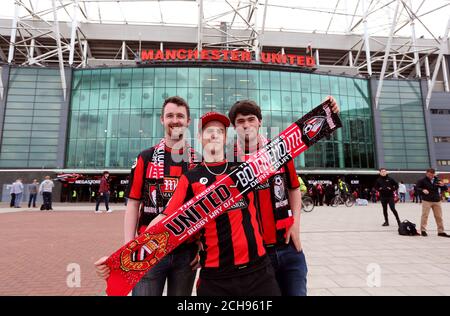 Bournemouth fans outside the ground ahead of the Barclays Premier League match at Old Trafford, Manchester. Stock Photo