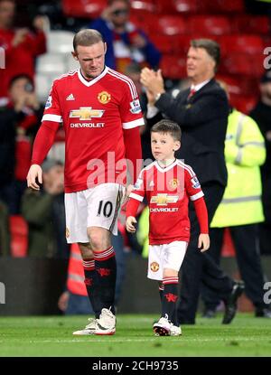 Manchester United's Wayne Rooney with son Kai after the Barclays Premier League match at Old Trafford, Manchester. Stock Photo