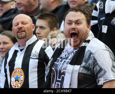 Newcastle United fans encourage their team during the Barclays Premier League match at St James' Park, Newcastle. Stock Photo