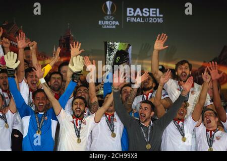 Sevilla lift the Europa League Trophy after the UEFA Europa League Final at St. Jakob-Park, Basel, Switzerland. Stock Photo