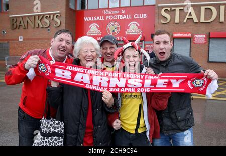 Barnsley fans hold a scarf outside Banks's Stadium before the Sky Bet League One Play-Off, Second Leg match between Walsall and Barnsley. Stock Photo