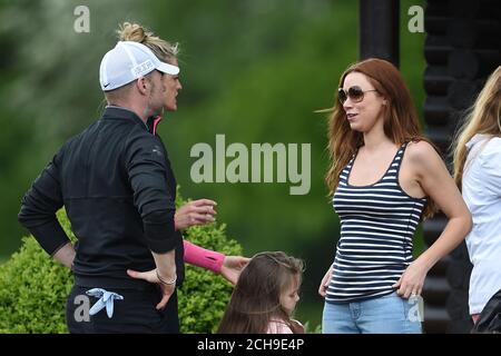 Una Healy (right) talks to Ronan Keating and Storm Keating during the ISPS HANDA Mike Tindall Celebrity Golf Classic in aid of Rugby For Heroes and The Matt Hampson Foundation, at the Belfry Golf & Resort Hotel in Sutton. Stock Photo