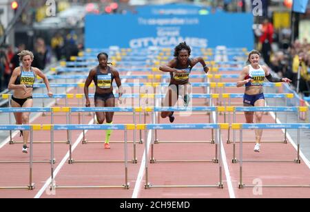 Tiffany Porter (centre right) before winning the Women's 100m Hurdles during the Co-op Bank Great City Games in Manchester. PRESS ASSOCIATION Photo. Picture date: Friday May 20, 2016. See PA story ATHLETICS Manchester. Photo credit should read: Martin Rickett/PA Wire Stock Photo
