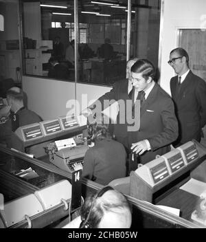 The Prince of Wales takes a tour of the Press Association. Stock Photo