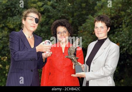 Pam Warren, a survivor of the Paddington train crash in October 1999, from Reading (C) alongside award winners Marie Colvin the Sunday Times correspondent (L) and professional yachtswoman Ellen MacArthur, during  the 'Women of the year Lunch 2001'.  *   at the Savoy Hotel in London. Stock Photo