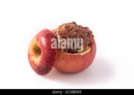 Stuffed apples baked with nuts isolated on white background Stock Photo