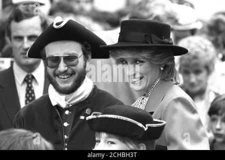 The Princess of Wales and Bill Beliveau compare hats in Shelburne today. The Princess and Prince Charles are on an 18-day tour of the eastern Canadian provinces. Stock Photo