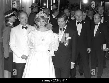 Canadian Prime Minister Pierre Trudeau leaving a banquet in Halifax, Novia Scotia, with the Prince and Princess of Wales. As the couple left, Prince Charles commented to press photographers 'Isn't she lovely?'. Stock Photo