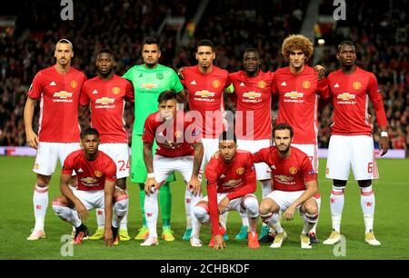 Manchester United's (back, left to right) Zlatan Ibrahimovic, Timothy Fosu-Mensah, Sergio Romero, Chris Smalling, Eric Bailly, Marouane Fellaini, Paul Pogba, (front, left to right) Marcus Rashford, Marcos Rojo, Jesse Lingard and Juan Mata pose for a photograph during the UEFA Europa League, Group A match at Old Trafford, Manchester. Stock Photo