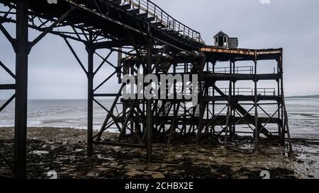 The North Jetty at Birnbeck Pier, near Weston-super-Mare, Somerset, which opened on June 5th 1867 and is now derelict and dilapidated. Stock Photo