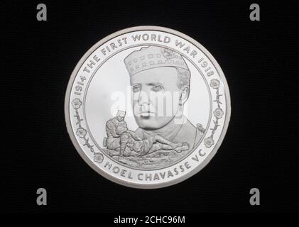 EMBARGOED TO 0001 MONDAY JULY 31 EDITORIAL USE ONLY A commemorative &pound;5 coin, which honours First World War hero Captain Noel Chavasse, unveiled by The Royal Mint at the Imperial War Museum in London.  Stock Photo