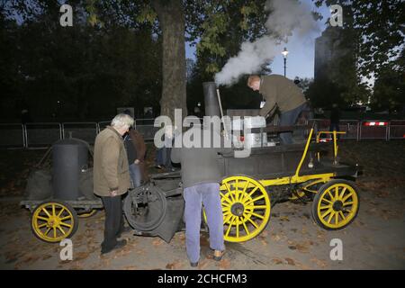 Participants prepare their vehicle in Hyde Park, London, during the annual Bonhams London to Brighton Veteran Car Run supported by Hiscox. Stock Photo