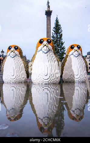 Three Porgs, the latest characters to join the Star Wars universe, appear in Trafalgar Square to launch the latest LEGO product range ahead of Christmas. Stock Photo