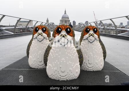 EDITORIAL USE ONLY Three Porgs, the latest characters to join the Star Wars universe, appear in Trafalgar Square to launch the latest LEGO product range ahead of Christmas.  Stock Photo