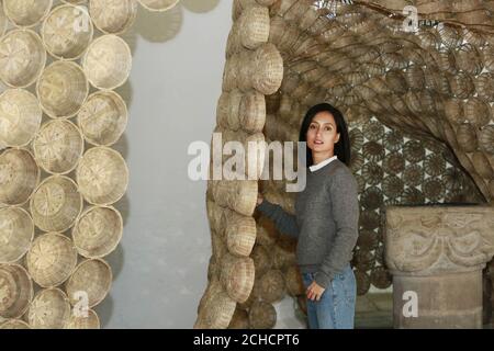 EDITORIAL USE ONLY Artist Rana Begum with her installation of bamboo baskets entitled No. 764 Baskets at St Peter's Chapel Cambridge as part of the opening exhibition of Kettle's Yard in Cambridge, which after a major two year transformation opens to the public on Saturday February 10th. PRESS ASSOCIATION. Photo. Picture date: Thursday February 1, 2018. Kettle's Yard, part of the consortium of the University of Cambridge Museums, has been transformed by Jamie Fobert Architects, whilst paying homage to the original creator Jim Ede. The development includes major new contemporary art exhibition Stock Photo