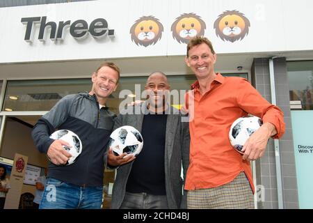 EDITORIAL USE ONLY (Left to right) Former England Footballers Teddy Sheringham, John Barnes and Tony Adams, at the unveiling of a Three UK store in Islington, London, which has been rebranded to feature three emoji lions, in celebration of the upcoming football tournament in Russia. Stock Photo