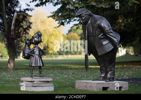 A statue of Roald Dahl's Matilda is unveiled in Great Missenden in Buckinghamshire, alongside one of President Donald Trump, to celebrate the 30th Anniversary of Matilda the novel. Stock Photo