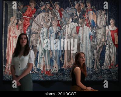 The Holy Grail Tapestries: The Arming and Departure of the Knights of the Round Table on the Quest for the Holy Grail, 1890-4, by Edward Burne-Jones during a photo call for a major retrospective of the Pre-Raphaelite painter at Tate Britain in London. Stock Photo