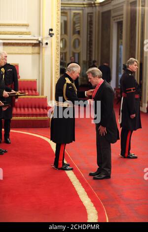 Hugh Laurie is made a CBE (Commander of the Order of the British Empire) by the Prince of Wales at Buckingham Palace. PRESS ASSOCIATION Photo. Picture date: Wednesday November 21, 2018. Photo credit should read: Yui Mok/PA Wire Stock Photo