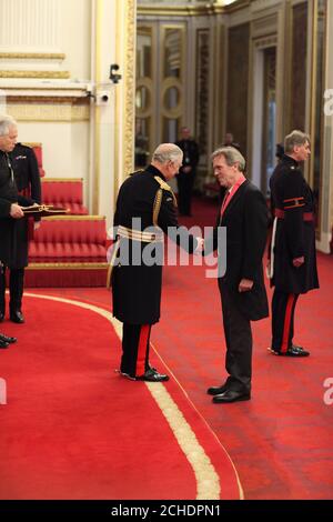 Hugh Laurie is made a CBE (Commander of the Order of the British Empire) by the Prince of Wales at Buckingham Palace. PRESS ASSOCIATION Photo. Picture date: Wednesday November 21, 2018. Photo credit should read: Yui Mok/PA Wire Stock Photo