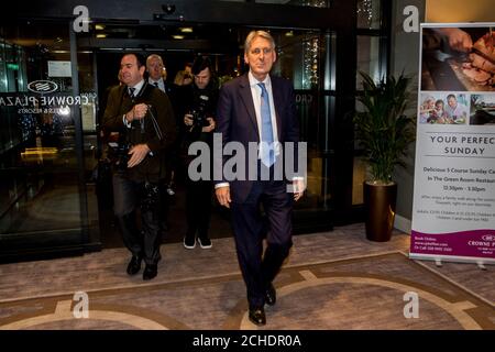 Chancellor of the Exchequer Philip Hammond arrives at the Crown Plaza Hotel in Belfast ahead of a private dinner with the DUP leader Arlene Foster and DUP leader at Westminster Nigel Dodds, and other members of the party during his visit to Northern Ireland. PRESS ASSOCIATION See PA Story POLITICS Brexit Ulster. Date: Friday 23 November 2018. Picture credit should read: Liam McBurney/PAWire