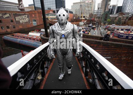 EDITORIAL USE ONLY Cybermen arrive in Birmingham to mark the release of the first round of tickets going on sale for BBC Studios and Escape Hunt's forthcoming Doctor Who Live Escape Game - Worlds Collide, which opens in the city in January. Stock Photo