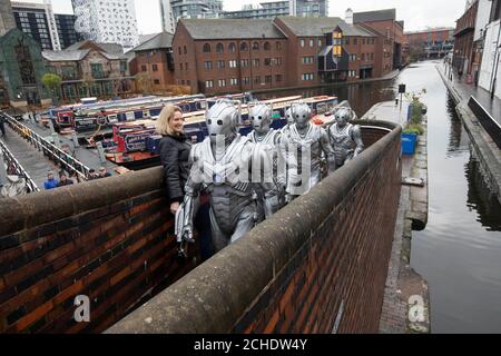 EDITORIAL USE ONLY Cybermen arrive in Birmingham to mark the release of the first round of tickets going on sale for BBC Studios and Escape Hunt's forthcoming Doctor Who Live Escape Game - Worlds Collide, which opens in the city in January. Stock Photo