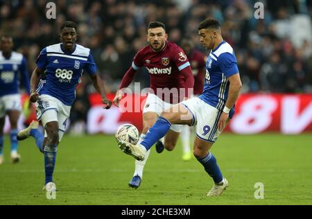 Birmingham City's Che Adams (right) in action during the Emirates FA Cup, third round match at London Stadium. Stock Photo