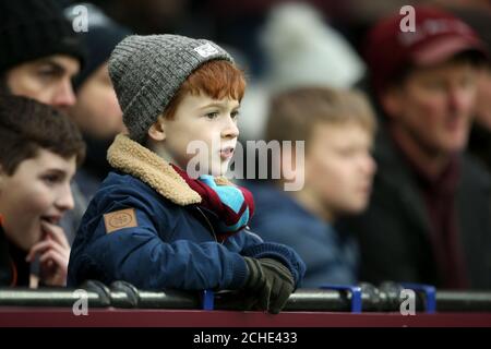 A young West Ham United fan in the stands during the Emirates FA Cup, third round match at London Stadium. Stock Photo