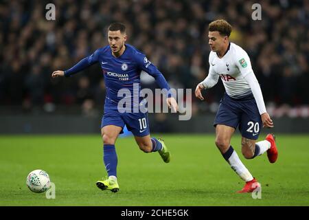 Chelsea's Eden Hazard (left) and Tottenham Hotspur's Dele Alli in action during the Carabao Cup, semi final match at Wembley, London. Stock Photo