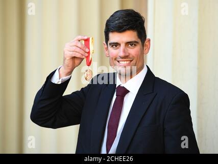 Alastair Cook with his knighthood following an investiture ceremony at Buckingham Palace, London. Stock Photo