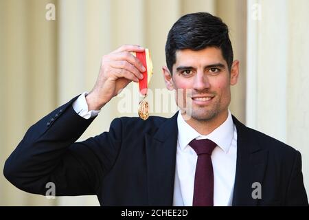 Alastair Cook with his knighthood following an investiture ceremony at Buckingham Palace, London. Stock Photo