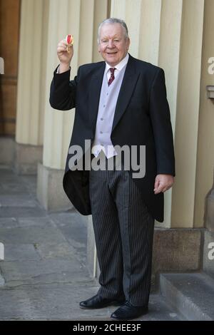 Sir William Beaumont with his knighthood for services to Rugby following an  investiture ceremony at Buckingham Palace, London Stock Photo - Alamy