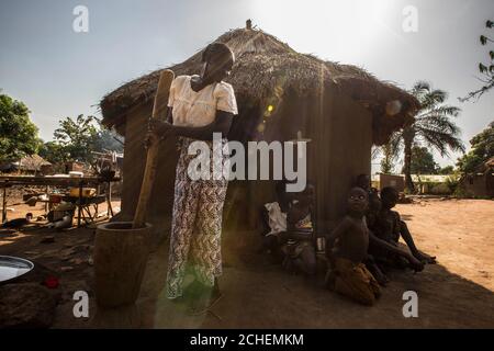 ONE USE ONLY NO ARCHIVE EDITORIAL USE ONLY Linda prepares a meal in her village in Yambio, South Sudan, and her image features in a photography exhibition from international children???s charity World Vision that goes on display from Friday 12th until Sunday 14th April at The Old Truman Brewery in Brick Lane, London. Stock Photo