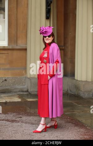 Fashion magazine editor Glenda Bailey who was made a Dame Commander of the British Empire for services to UK prosperity, charity, fashion and journalism by the Prince of Wales, following an investiture ceremony at Buckingham Palace, London. Stock Photo