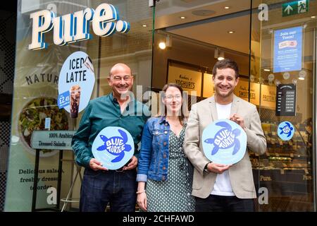 EDITORIAL USE ONLY (Left to right) Director of Shaftesbury Simon Quayle, Head of Marketing at Pure Keri Butler and Director of Project Zero Tyrone Wood gather on Carnaby Street to celebrate the first Carnaby tenants to receive the Blue Turtle Mark, London. Stock Photo