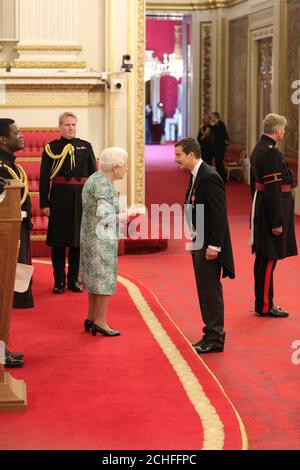 Edward 'Bear' Grylls from Ramsbury is made an OBE (Officer of the Order of the British Empire) by Queen Elizabeth II at Buckingham Palace. PRESS ASSOCIATION Photo. Picture date: Thursday October 10, 2019. Photo credit should read: Yui Mok/PA Wire Stock Photo