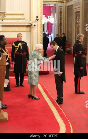 Edward 'Bear' Grylls from Ramsbury is made an OBE (Officer of the Order of the British Empire) by Queen Elizabeth II at Buckingham Palace. PRESS ASSOCIATION Photo. Picture date: Thursday October 10, 2019. Photo credit should read: Yui Mok/PA Wire Stock Photo