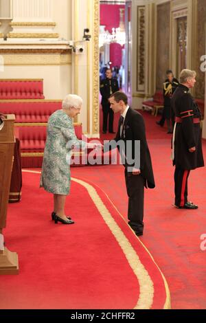 Mr. Christopher Jewell is decorated with the Queen's Gallantry Medal by Queen Elizabeth II at Buckingham Palace. PRESS ASSOCIATION Photo. Picture date: Thursday October 10, 2019. Photo credit should read: Yui Mok/PA Wire Stock Photo