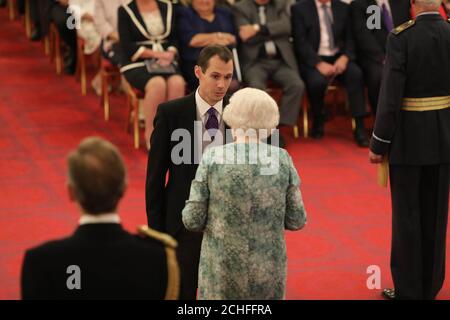 Mr. Christopher Jewell is decorated with the Queen's Gallantry Medal by Queen Elizabeth II at Buckingham Palace. PRESS ASSOCIATION Photo. Picture date: Thursday October 10, 2019. Photo credit should read: Yui Mok/PA Wire Stock Photo