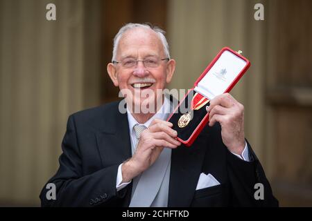 Owner of Tunnock's Sir Boyd Tunnock with his knighthood following an investiture ceremony at Buckingham Palace, London. Stock Photo