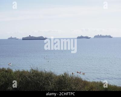 moored surplus cruise ships in the bay at Weymouth in Dorset united Kingdom  Stock Photo