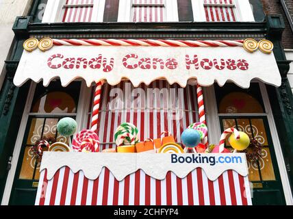 EDITORIAL USE ONLY A Candy Cane House is unveiled in Soho by Booking.com, just in time for the festive period. PA Photo. Picture date: Tuesday December 17, 2019. The unique accommodation is available to stay at for a limited time only and guests will spend their stay immersed in candy, chocolate, gingerbread and more. Photo credit should read: Doug Peters/PA Wire  Stock Photo