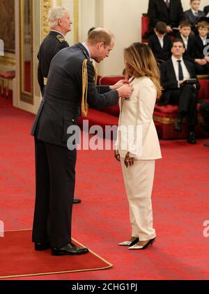 Rapper and singer MIA - real name Mathangi Arulpragasam is made an MBE (Member of the Order of the British Empire) by the Duke of Cambridge at Buckingham Palace. Stock Photo