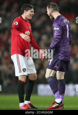 Manchester United's Victor Lindelof celebrates win over Manchester City with Manchester United goalkeeper David de Gea during the Premier League match at Old Trafford, Manchester. Stock Photo